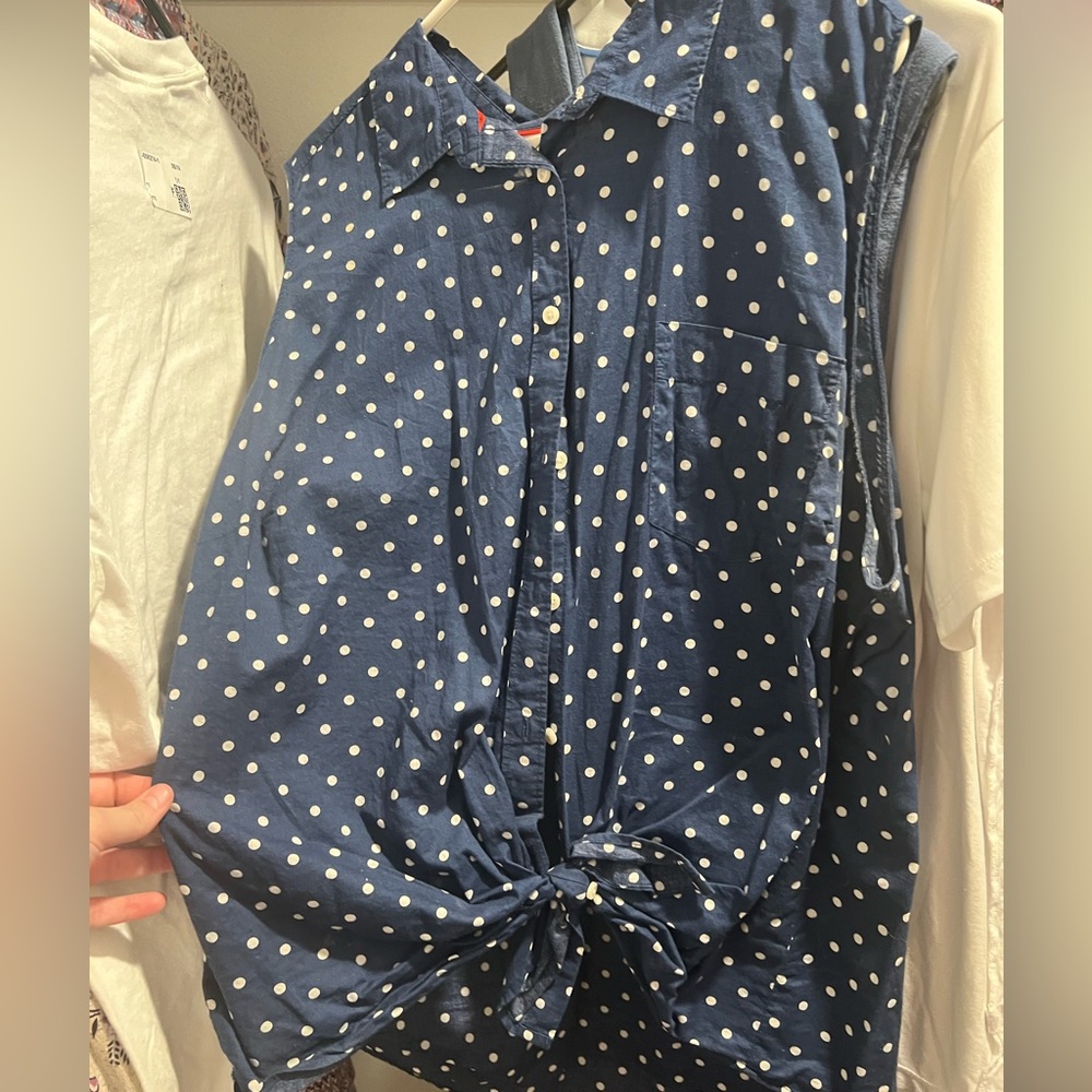 Sleeveless button down shirt
